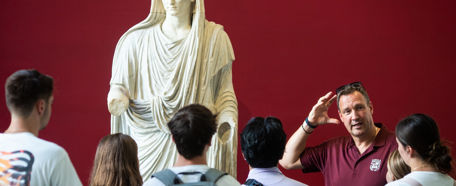 Professor Alexander Ever teaches his class in a museum in Rome